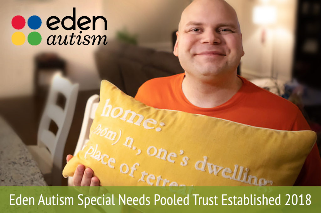 person with special needs holding a pillow